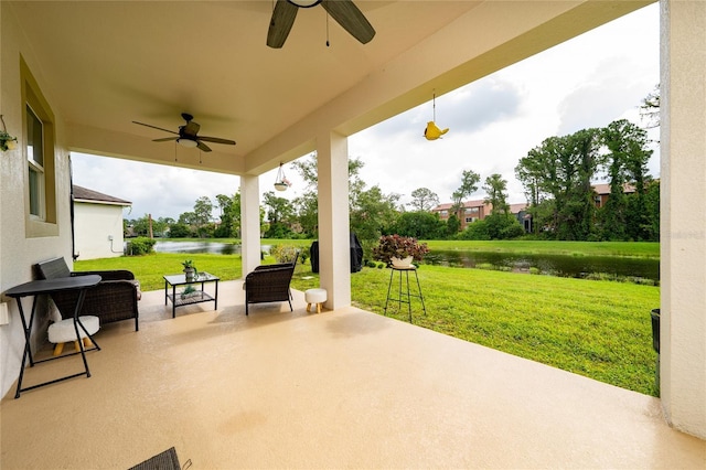 4952 Longmeadow Park St, Orlando, FL 32811 - view of patio / terrace featuring ceiling fan and a water view