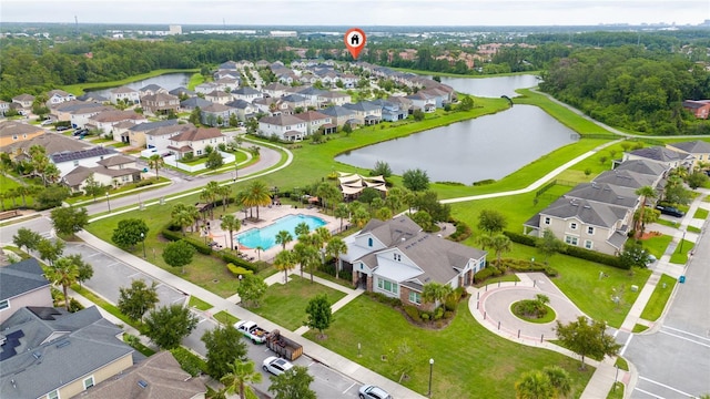 4952 Longmeadow Park St, Orlando, FL 32811 - aerial view of residential area with a nearby body of water and a pool area