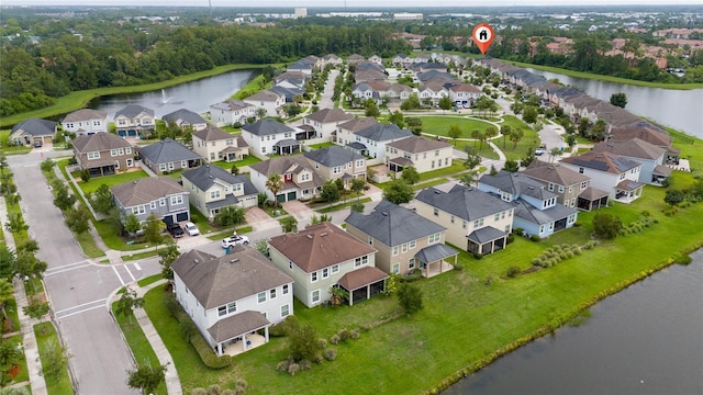 4952 Longmeadow Park St, Orlando, FL 32811 - aerial perspective of suburban area with a nearby body of water