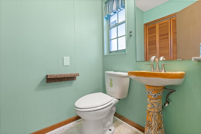 1135 Thunder Trl, Maitland, FL 32751 - bathroom featuring speckled floor, baseboards, toilet, and a sink