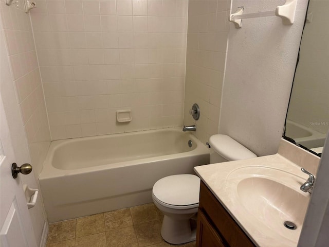 2018 Cypress Bay Blvd, Kissimmee, FL 34743 - bathroom with toilet, vanity, and shower / bathtub combination