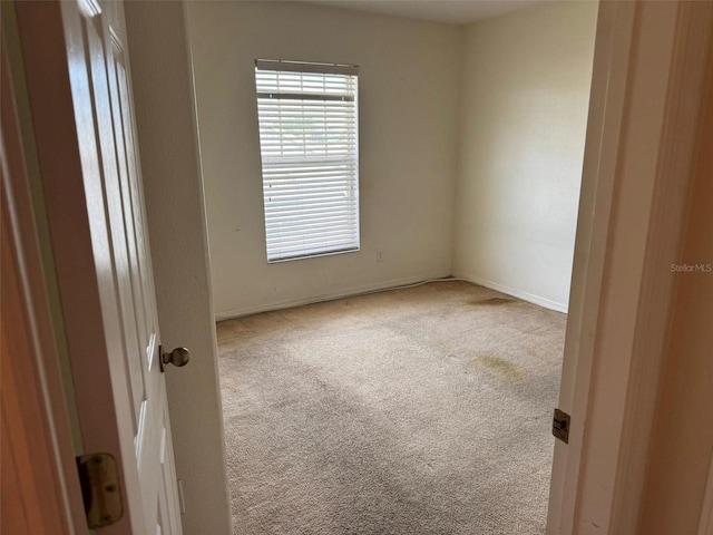2018 Cypress Bay Blvd, Kissimmee, FL 34743 - spare room with carpet flooring and baseboards