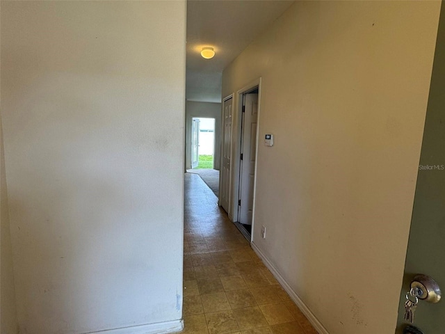 2018 Cypress Bay Blvd, Kissimmee, FL 34743 - hallway featuring baseboards