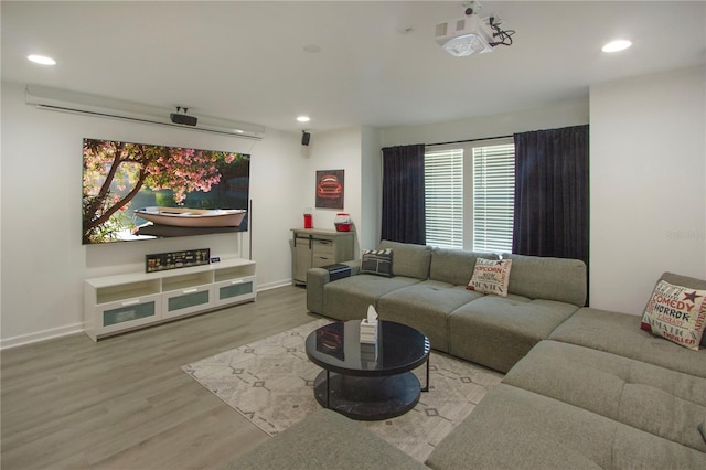 95353 Orchid Blossom Trl, Fernandina Beach, FL 32034 - living area featuring wood finished floors, recessed lighting, and baseboards