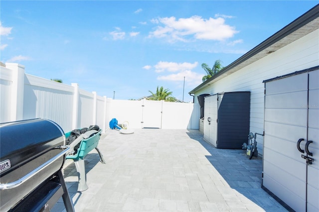 95353 Orchid Blossom Trl, Fernandina Beach, FL 32034 - fenced backyard with a patio and a gate