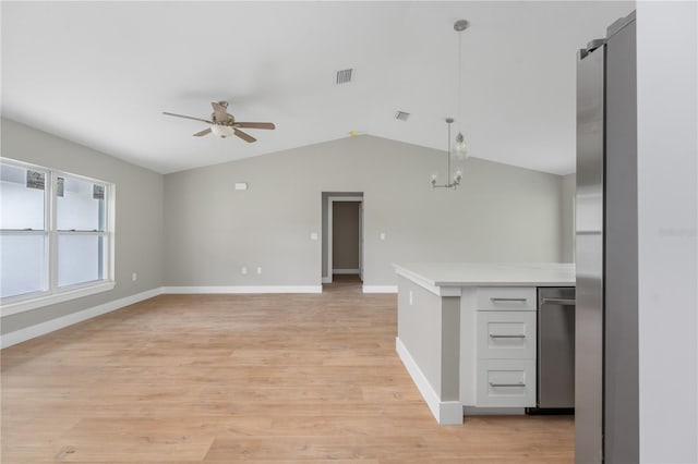 9299 N Tahiti Way, Citrus Springs, FL 34433 - kitchen with a ceiling fan, light countertops, stainless steel dishwasher, lofted ceiling, and pendant lighting