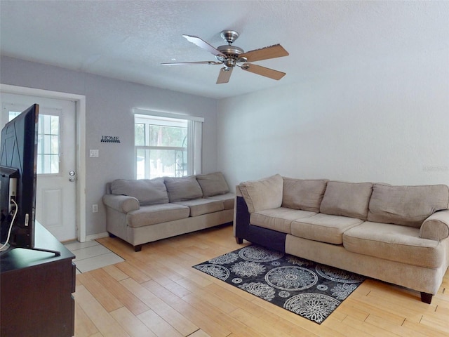 720 Meadow St, Sanford, FL 32773 - living room with a ceiling fan and light wood-type flooring