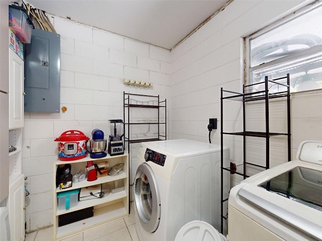 720 Meadow St, Sanford, FL 32773 - laundry room with electric panel, independent washer and dryer, and tile walls