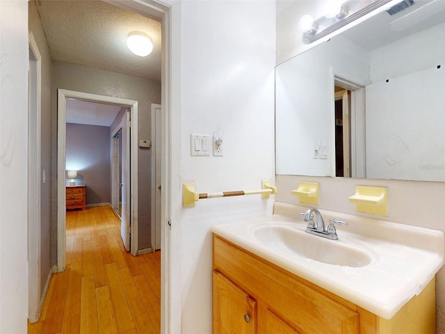 720 Meadow St, Sanford, FL 32773 - bathroom with wood finished floors and vanity