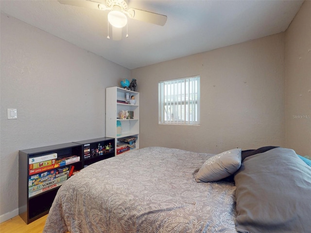 720 Meadow St, Sanford, FL 32773 - bedroom with light wood-style flooring and a ceiling fan