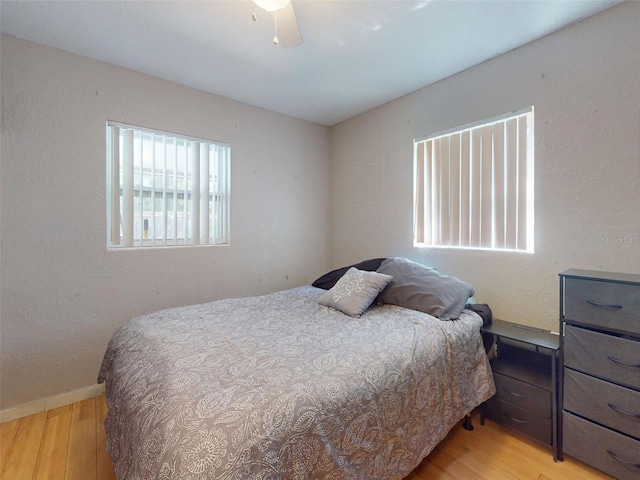 720 Meadow St, Sanford, FL 32773 - bedroom with wood finished floors and ceiling fan