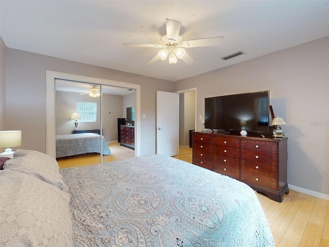 720 Meadow St, Sanford, FL 32773 - bedroom with light wood-style flooring, ceiling fan, and a closet