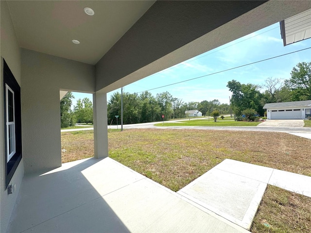 10333 N Halsey Way, Citrus Springs, FL 34434 - view of green lawn with a patio area
