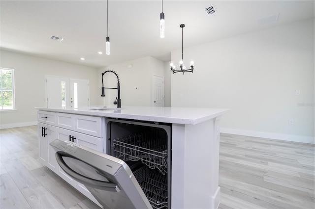 10333 N Halsey Way, Citrus Springs, FL 34434 - kitchen featuring a sink, light wood-type flooring, beverage cooler, white cabinetry, and pendant lighting