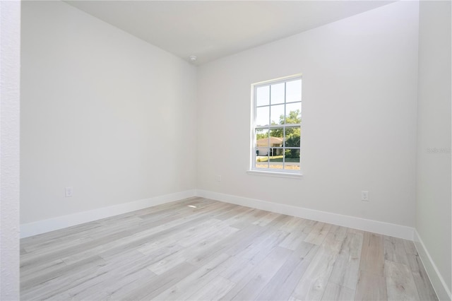 10333 N Halsey Way, Citrus Springs, FL 34434 - spare room with light wood-type flooring and baseboards