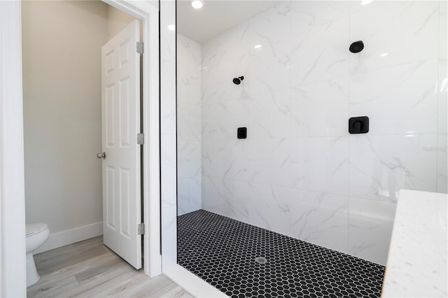 10333 N Halsey Way, Citrus Springs, FL 34434 - full bathroom with a marble finish shower, toilet, and wood finished floors