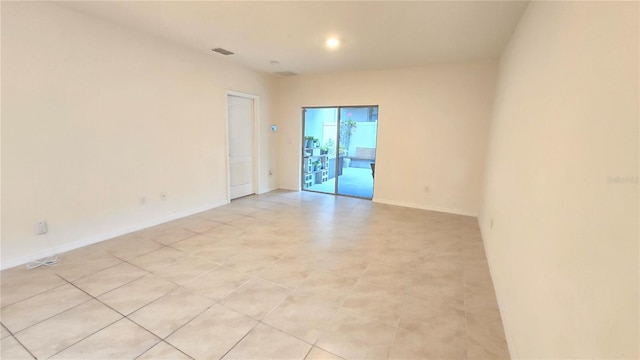 3202 Timber Hawk Cir, Ocoee, FL 34761 - unfurnished room featuring baseboards, light tile patterned floors, and recessed lighting
