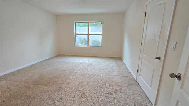 3202 Timber Hawk Cir, Ocoee, FL 34761 - empty room featuring light colored carpet and baseboards