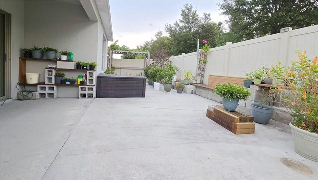 3202 Timber Hawk Cir, Ocoee, FL 34761 - fenced backyard with a patio