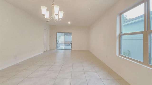 3202 Timber Hawk Cir, Ocoee, FL 34761 - spare room featuring a chandelier, light tile patterned floors, and recessed lighting