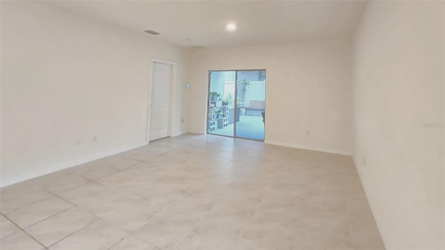 3202 Timber Hawk Cir, Ocoee, FL 34761 - spare room with baseboards and recessed lighting