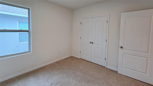 3202 Timber Hawk Cir, Ocoee, FL 34761 - unfurnished bedroom featuring carpet floors and a closet