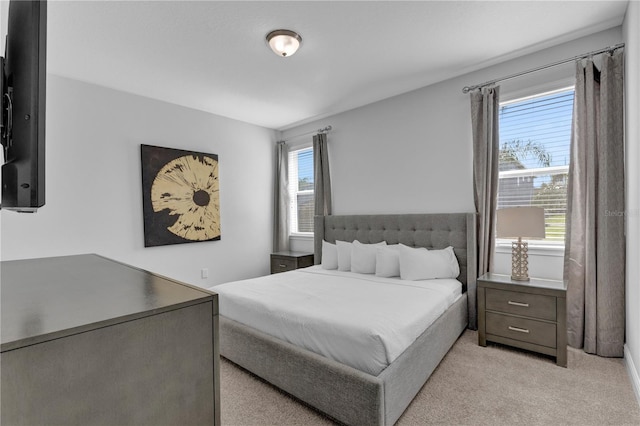 7524 Marker Ave, Kissimmee, FL 34747 - bedroom with light colored carpet