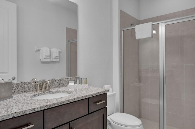 7524 Marker Ave, Kissimmee, FL 34747 - full bathroom featuring toilet, vanity, and a shower stall