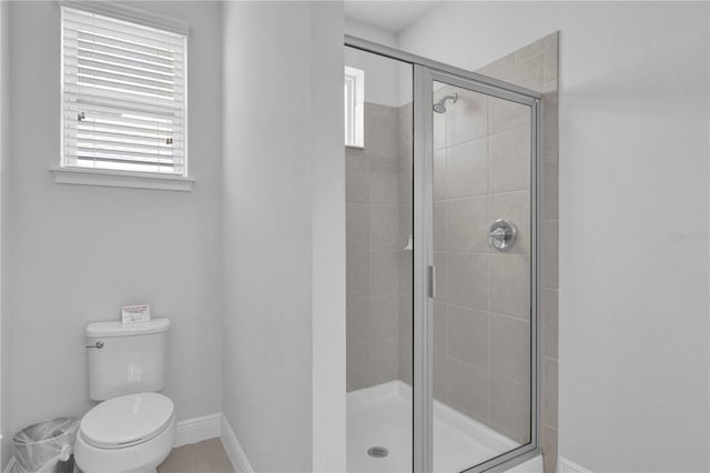 7524 Marker Ave, Kissimmee, FL 34747 - full bathroom featuring toilet, a shower stall, and baseboards