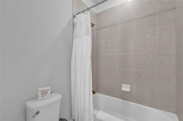 7524 Marker Ave, Kissimmee, FL 34747 - bathroom with toilet and shower / tub combo