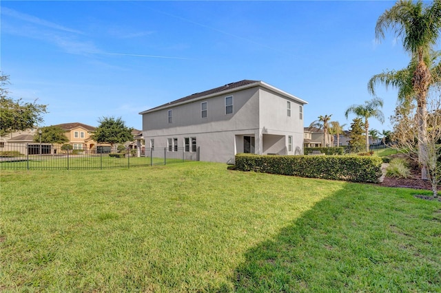 7524 Marker Ave, Kissimmee, FL 34747 - back of house featuring stucco siding