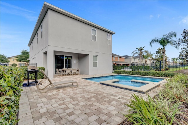 7524 Marker Ave, Kissimmee, FL 34747 - view of swimming pool with a patio and a pool with connected hot tub