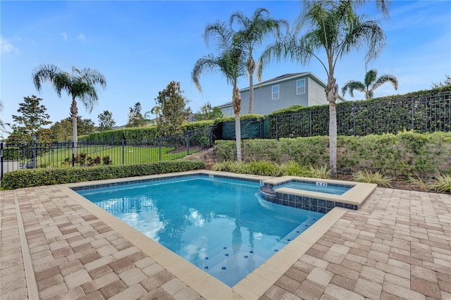 7524 Marker Ave, Kissimmee, FL 34747 - view of pool with a patio area, a fenced backyard, and a pool with connected hot tub
