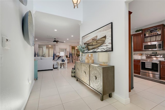 217 Lake Cassidy Dr, Kissimmee, FL 34759 - hall with light tile patterned flooring, recessed lighting, and baseboards