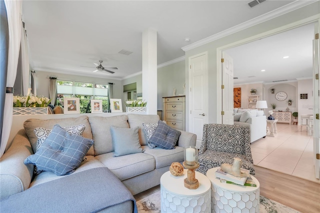 217 Lake Cassidy Dr, Kissimmee, FL 34759 - living room featuring crown molding, a ceiling fan, light wood-style floors, and recessed lighting