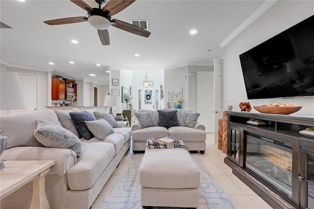 217 Lake Cassidy Dr, Kissimmee, FL 34759 - living area featuring crown molding, ceiling fan, recessed lighting, and light tile patterned floors