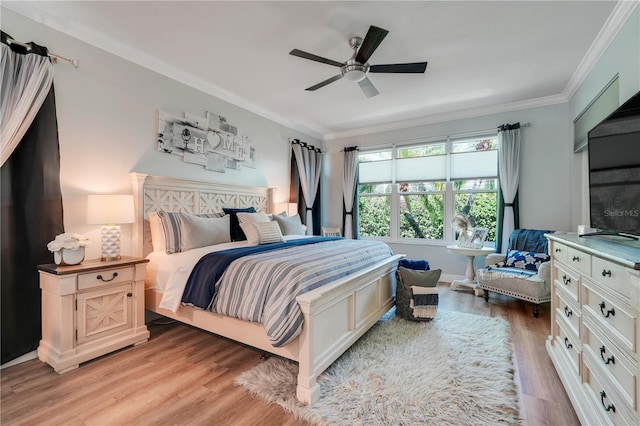217 Lake Cassidy Dr, Kissimmee, FL 34759 - bedroom with light wood finished floors, ornamental molding, and a ceiling fan