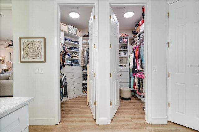 217 Lake Cassidy Dr, Kissimmee, FL 34759 - walk in closet featuring light wood-style flooring and ceiling fan