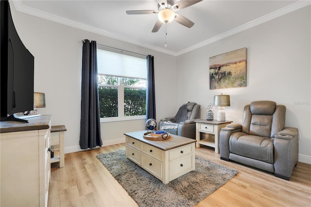 217 Lake Cassidy Dr, Kissimmee, FL 34759 - living area with crown molding, light wood-type flooring, ceiling fan, and baseboards