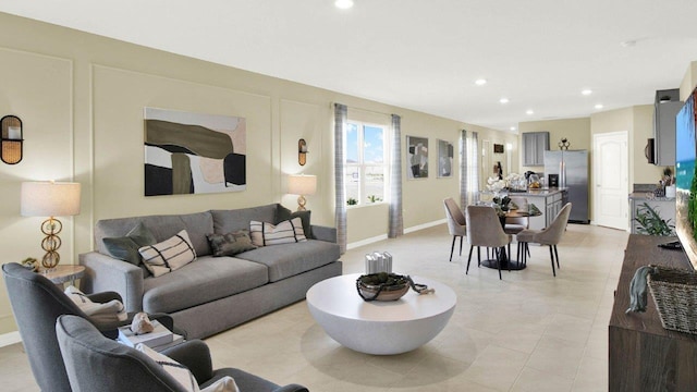 4932 Kaia Ave, Winter Haven, FL 33884 - living area with recessed lighting, light tile patterned floors, and baseboards
