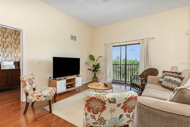 9051 Treasure Trove Ln Unit 505, Kissimmee, FL 34747 - living area featuring wood finished floors and baseboards