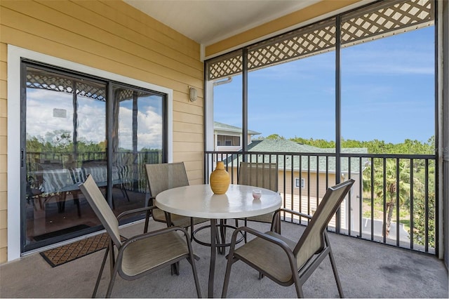 9051 Treasure Trove Ln Unit 505, Kissimmee, FL 34747 - sunroom featuring plenty of natural light
