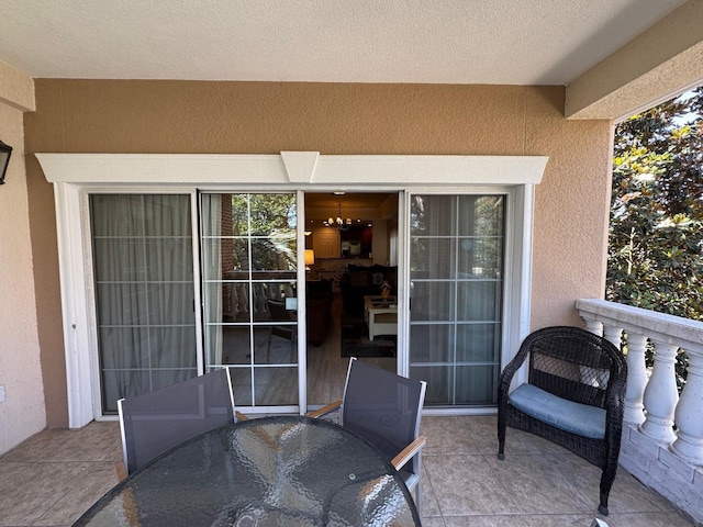 7651 Whisper Way Unit 201, Kissimmee, FL 34747 - view of patio with a balcony and outdoor dining area