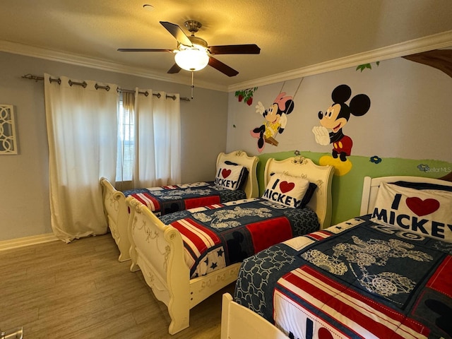 7651 Whisper Way Unit 201, Kissimmee, FL 34747 - bedroom with light wood-style flooring, ornamental molding, a ceiling fan, and baseboards
