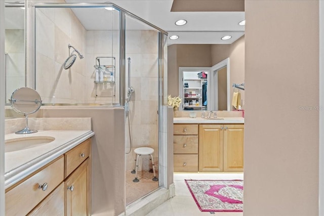 206 Islandia Ct Unit U206, Satellite Beach, FL 32937 - bathroom with vanity, a shower stall, recessed lighting, and tile patterned flooring