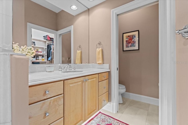 206 Islandia Ct Unit U206, Satellite Beach, FL 32937 - bathroom featuring vanity, tile patterned flooring, toilet, and baseboards