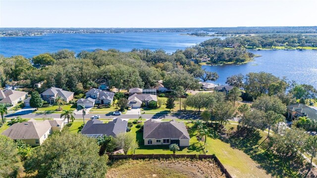 1301 Johns Cove Ln, Oakland, FL 34787 - aerial perspective of suburban area with a large body of water