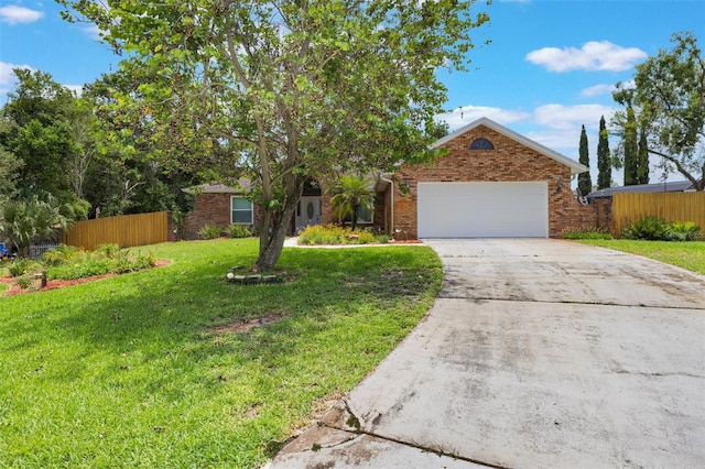 109 Hunter Point Ct, Debary, FL 32713 - view of property hidden behind natural elements featuring driveway, brick siding, and a garage