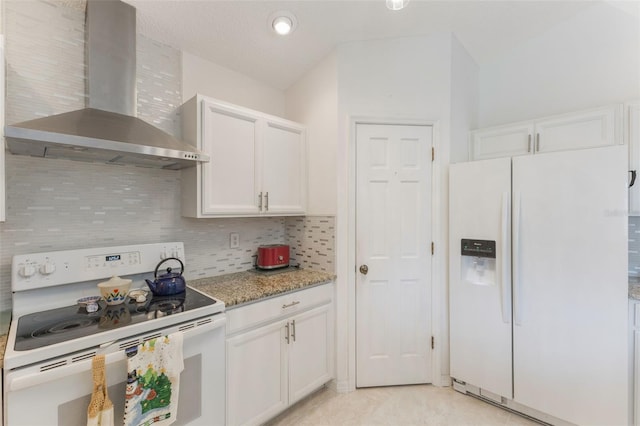 109 Hunter Point Ct, Debary, FL 32713 - kitchen featuring white appliances, wall chimney exhaust hood, tasteful backsplash, and white cabinets