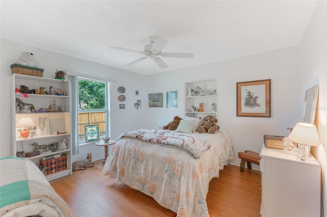 109 Hunter Point Ct, Debary, FL 32713 - bedroom featuring light wood-type flooring, ceiling fan, and baseboards